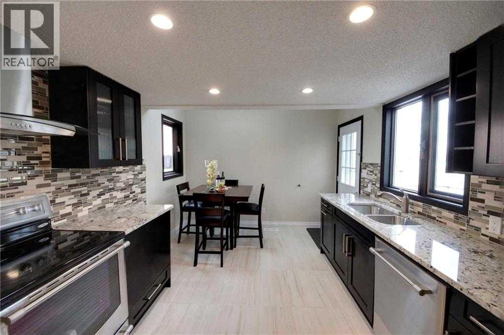 919 1 Street NW, Calgary, Alberta  T2M 2R9 - Photo 14 - A2292108