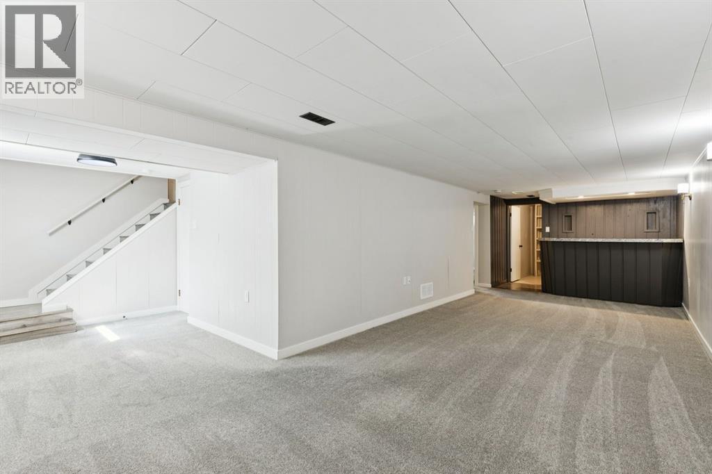 48 Haddock Road SW, Calgary, Alberta  T2V 3J8 - Photo 21 - A2309593