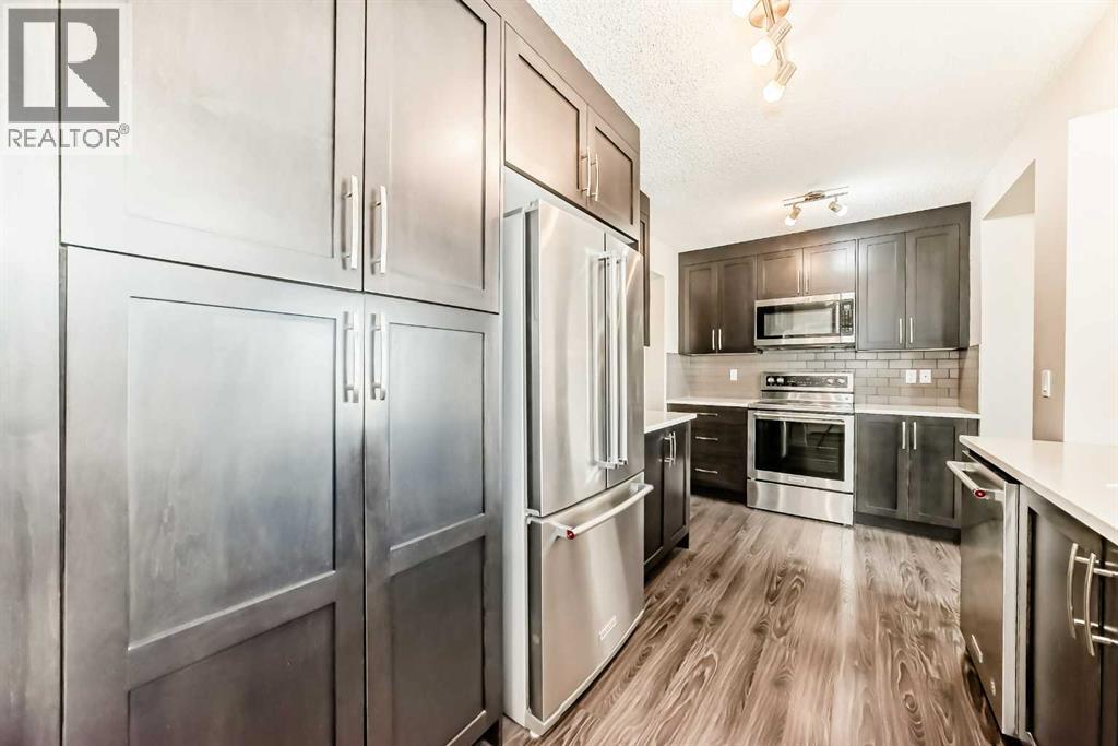 901, 2400 Ravenswood View SE, Airdrie, Alberta  T4A 0V7 - Photo 6 - A2312538