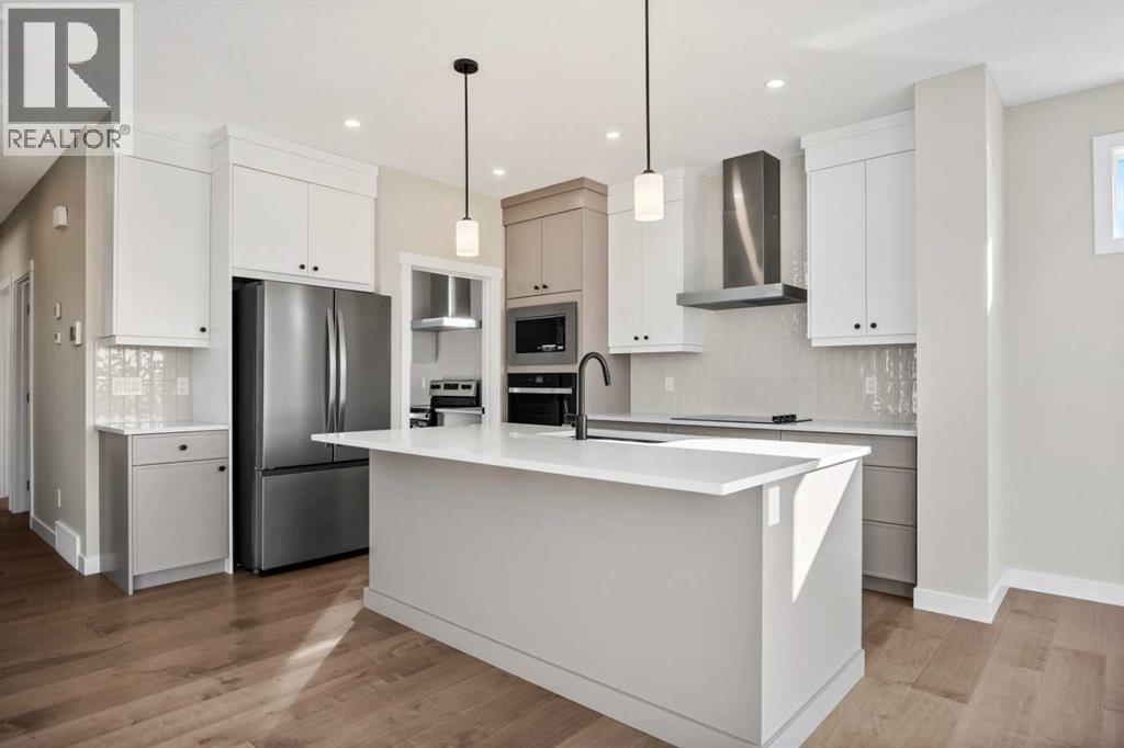 151 Dawson Wharf Mount, Chestermere, Alberta  T1X 2W4 - Photo 9 - A2292338