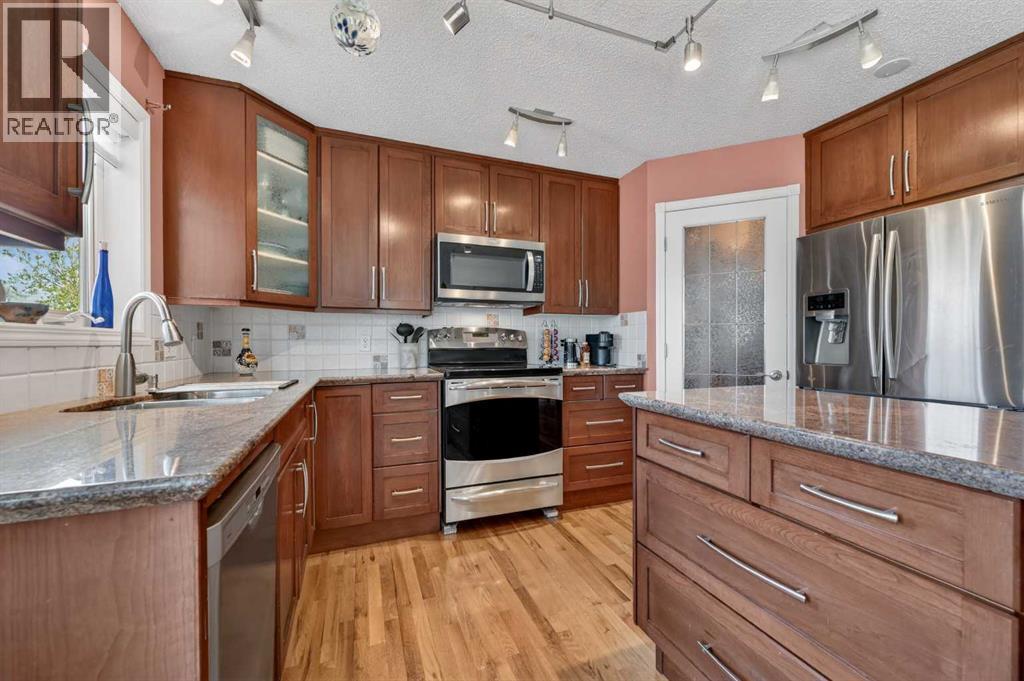 230 Rocky Ridge Cove NW, Calgary, Alberta  T3G 4L1 - Photo 13 - A2303867