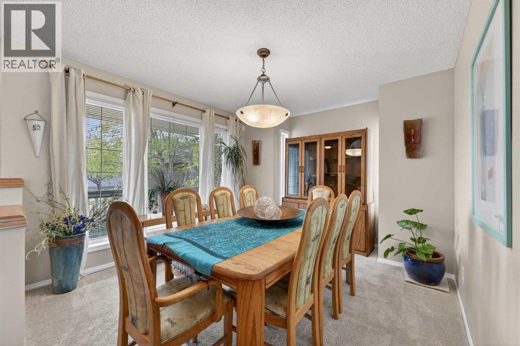 230 Rocky Ridge Cove NW, Calgary, Alberta  T3G 4L1 - Photo 4 - A2303867