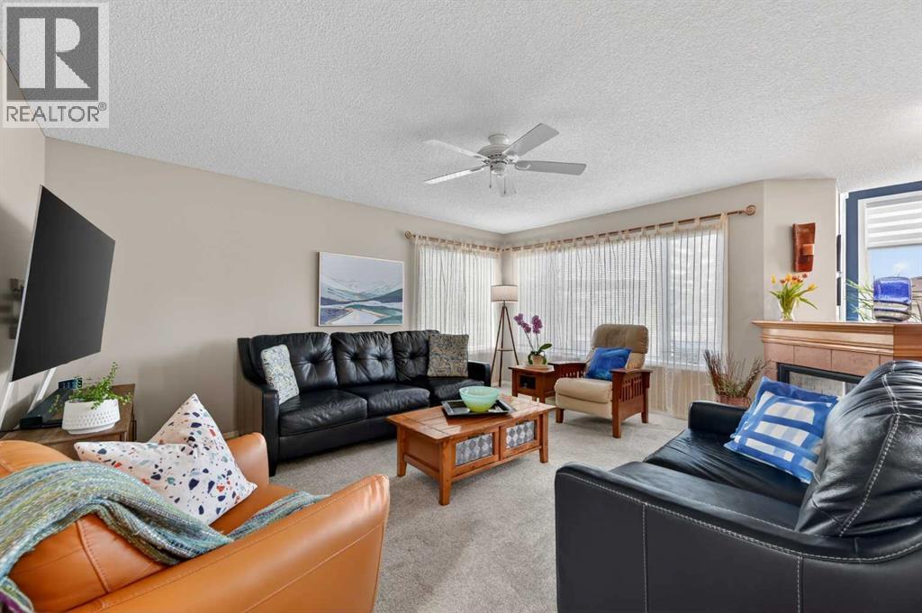 230 Rocky Ridge Cove NW, Calgary, Alberta  T3G 4L1 - Photo 6 - A2303867