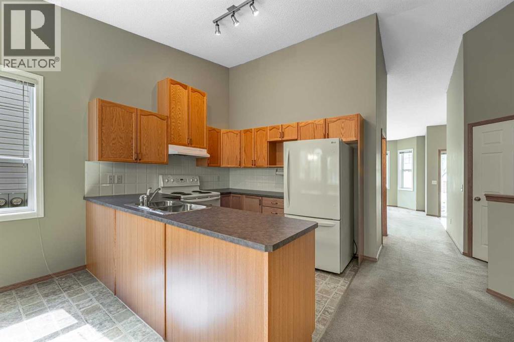 44 Prestwick Pond Terrace SE, Calgary, Alberta  T2Z 3Z8 - Photo 7 - A2312751