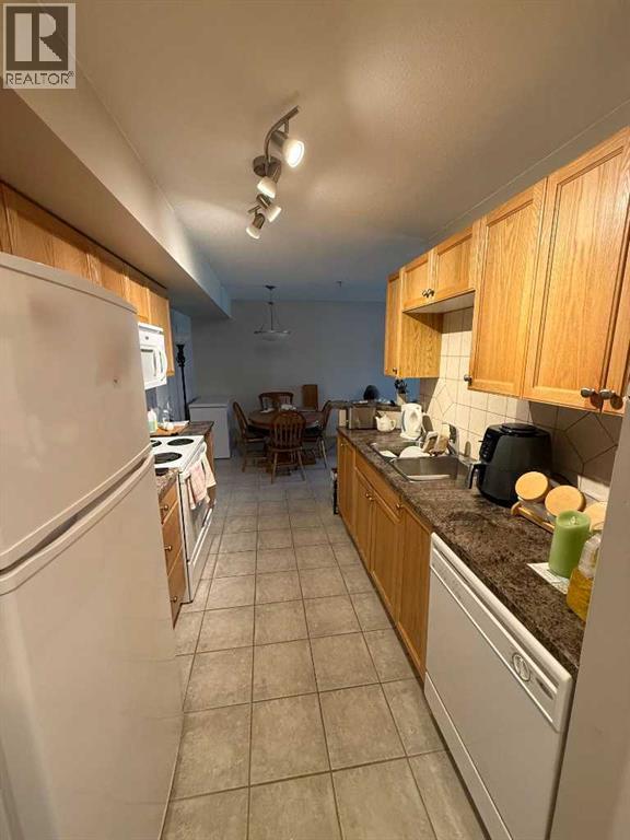 207, 5205 Woodland Road, Innisfail, Alberta  T4G 0B2 - Photo 7 - A2308466