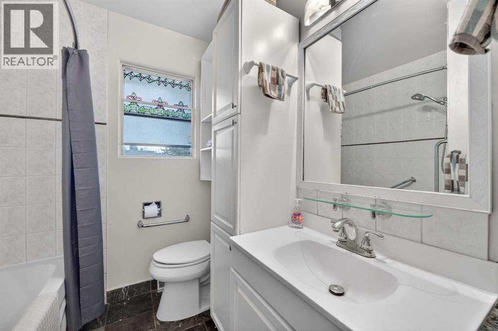 9211 Elbow Drive SW, Calgary, Alberta  T2V 1L5 - Photo 19 - A2309600