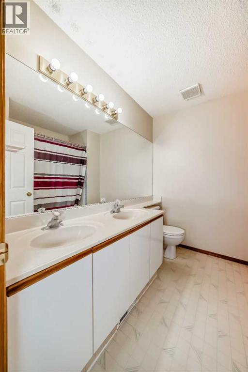 31 Harvest Oak Circle NE, Calgary, Alberta  T3K 4S6 - Photo 26 - A2312205