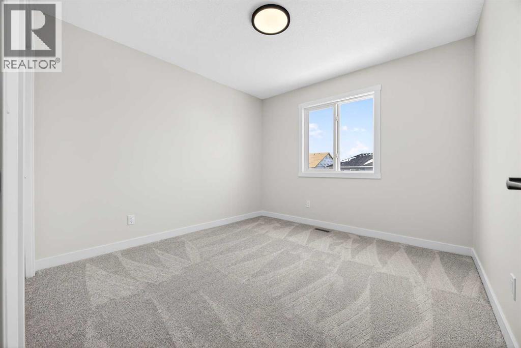 52 Fireside Common SW, Cochrane, Alberta  T4C 3E1 - Photo 37 - A2286463