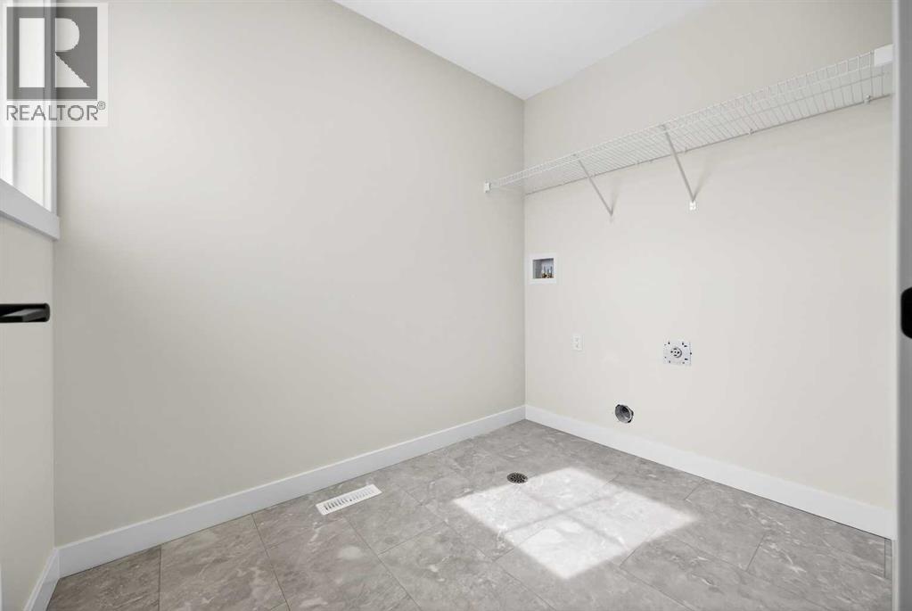 52 Fireside Common SW, Cochrane, Alberta  T4C 3E1 - Photo 43 - A2286463