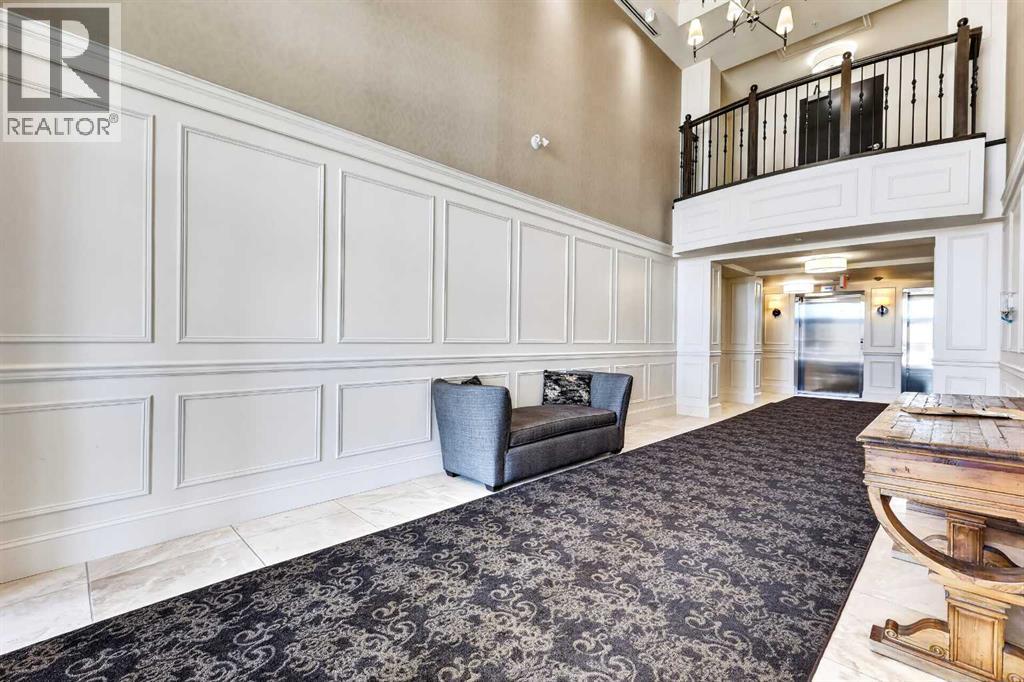 306, 211 Quarry Way SE, Calgary, Alberta  T2C 5M6 - Photo 3 - A2310961