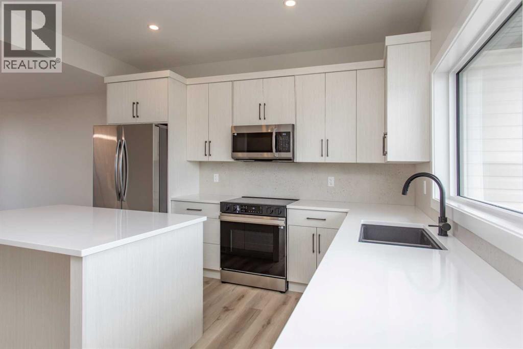 65 Lavelle Close, Red Deer, Alberta  T4R 0V7 - Photo 3 - A2308259