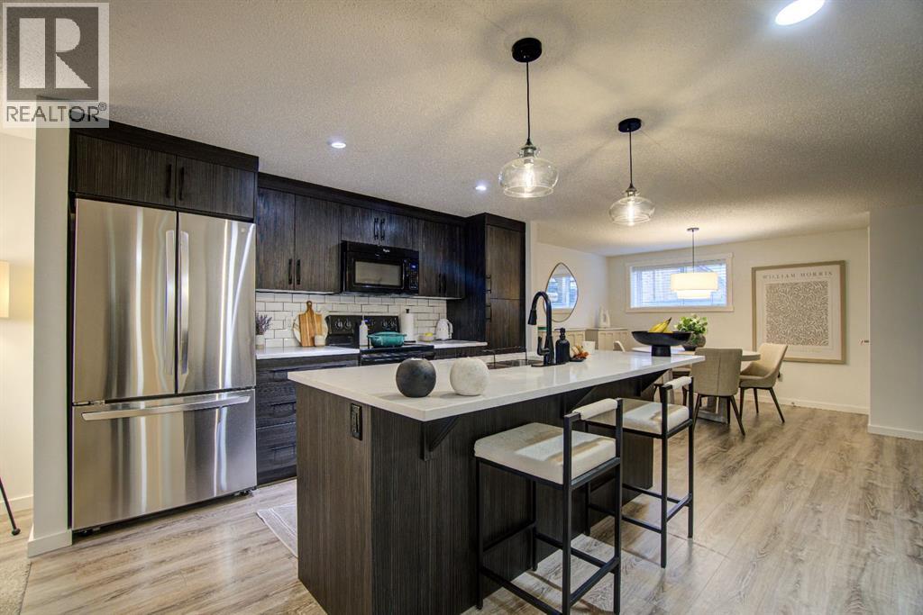 410, 50 Westland Road, Okotoks, Alberta  T1S 0B4 - Photo 1 - A2302151