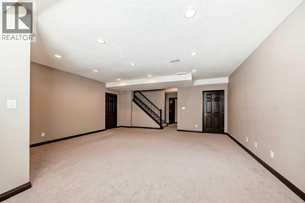 229 Panamount Road NW, Calgary, Alberta  T3K 0H9 - Photo 27 - A2306162