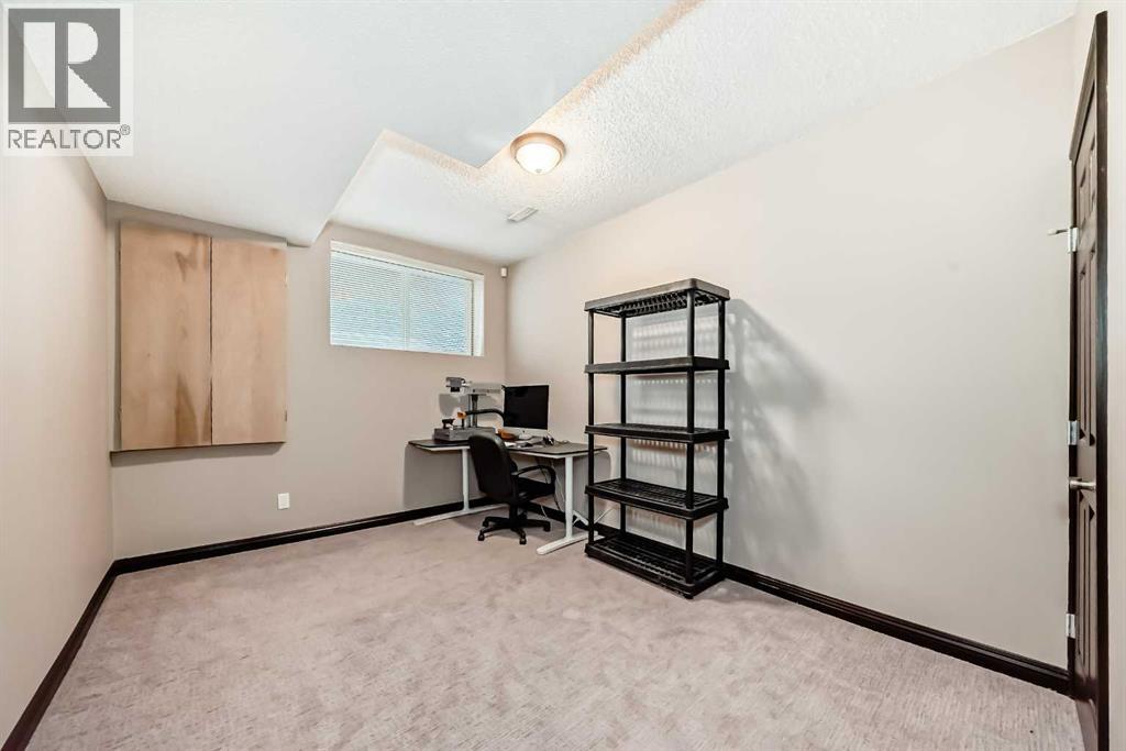 229 Panamount Road NW, Calgary, Alberta  T3K 0H9 - Photo 29 - A2306162