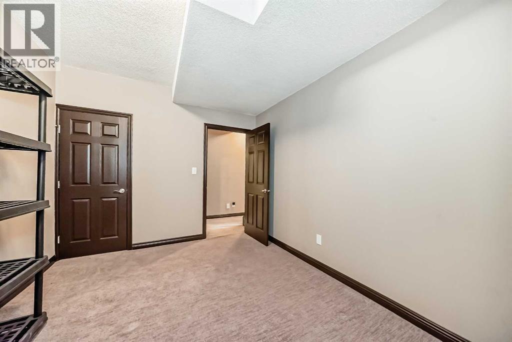 229 Panamount Road NW, Calgary, Alberta  T3K 0H9 - Photo 30 - A2306162