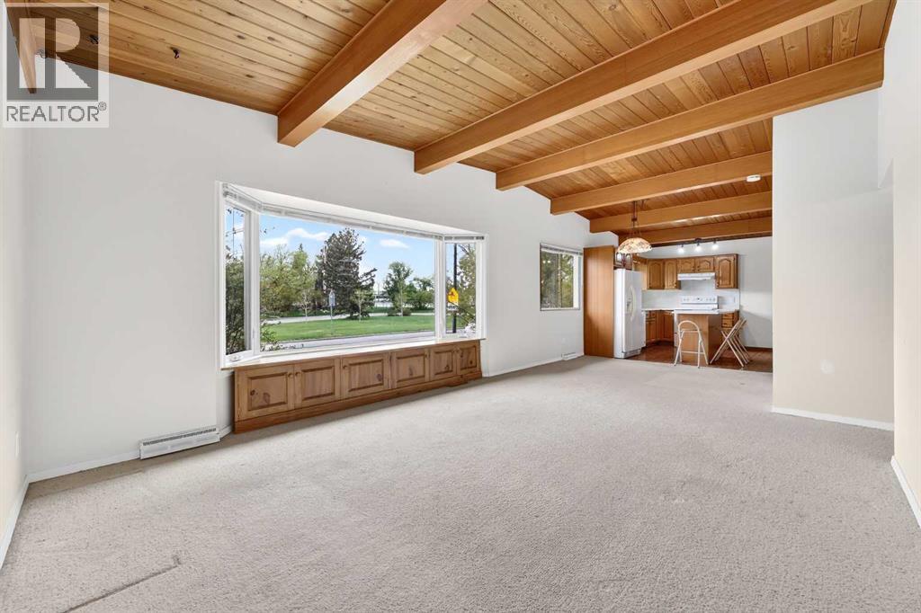 920 87 Avenue SW, Calgary, Alberta  T2V 0W1 - Photo 3 - A2312172