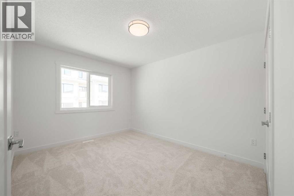 87 Heritage Manor, Cochrane, Alberta  T4C 0L3 - Photo 9 - A2281386
