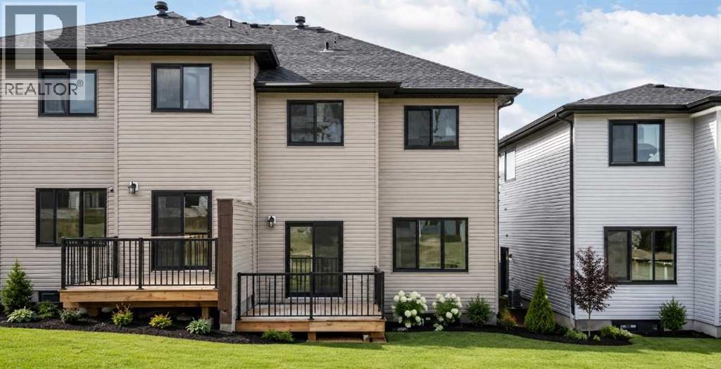 87 Heritage Manor, Cochrane, Alberta  T4C 0L3 - Photo 24 - A2281386