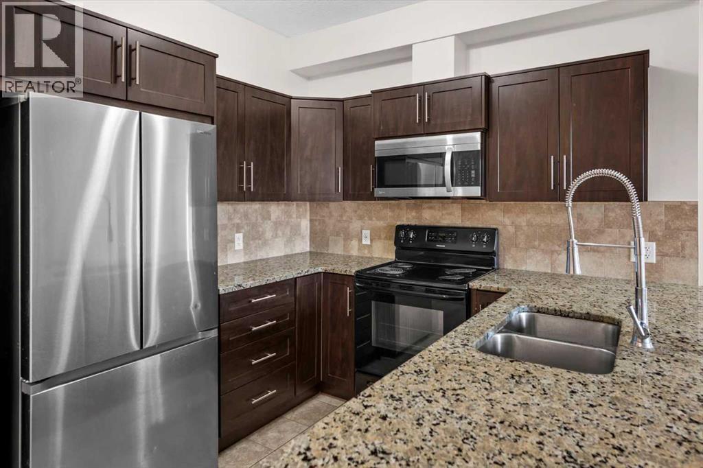 1227, 1540 Sherwood Boulevard NW, Calgary, Alberta  T3R 0K5 - Photo 9 - A2306813