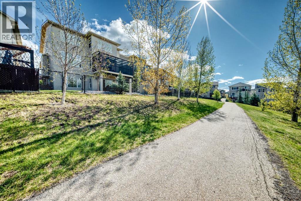 115 Sunset Way, Cochrane, Alberta T4C 0E9 - Photo 3 - A2311739