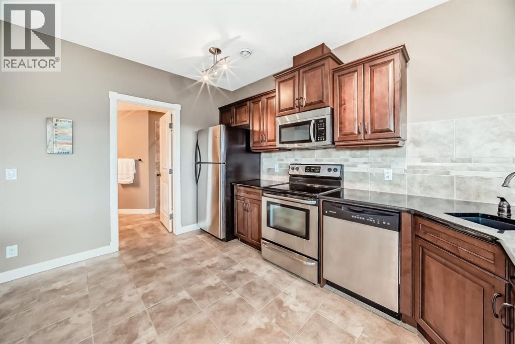 115 Sunset Way, Cochrane, Alberta T4C 0E9 - Photo 35 - A2311739