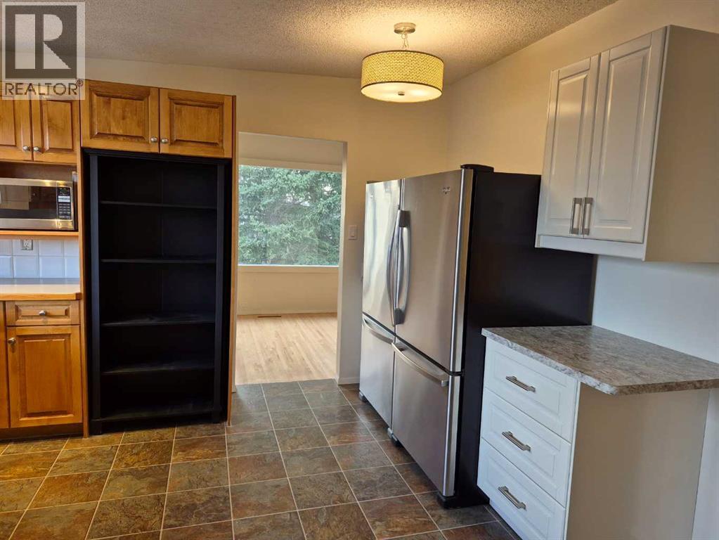 3415 Benton Drive NW, Calgary, Alberta  T2L 1W7 - Photo 10 - A2305111