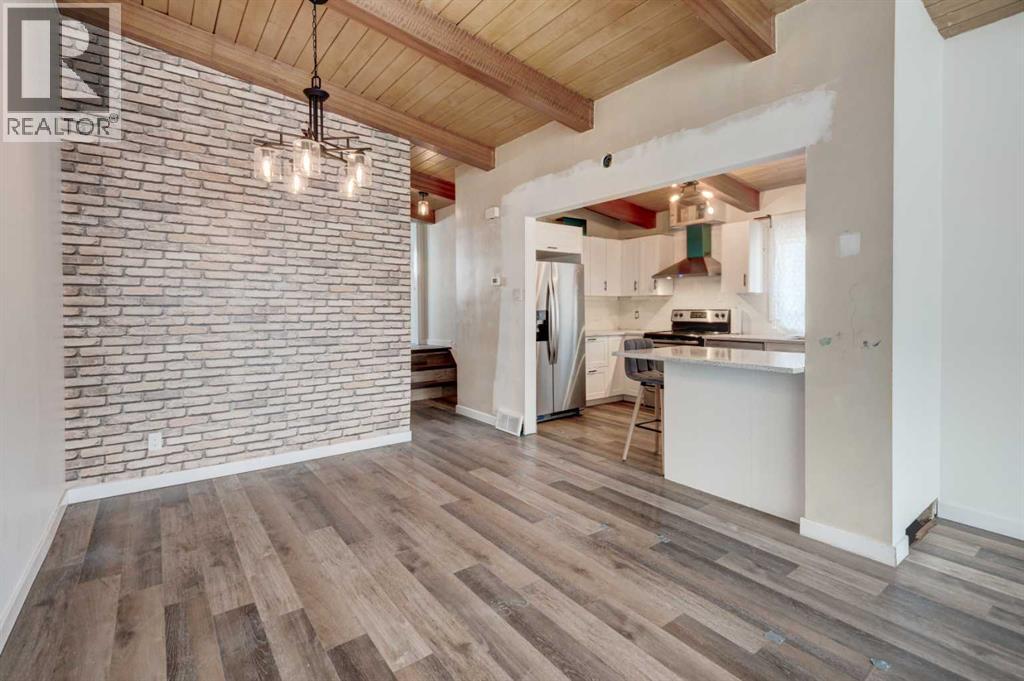 717 67 Avenue SW, Calgary, Alberta  T2V 0M4 - Photo 8 - A2299446