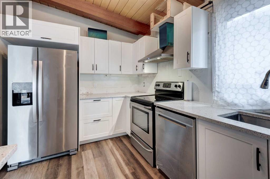 717 67 Avenue SW, Calgary, Alberta  T2V 0M4 - Photo 15 - A2299446