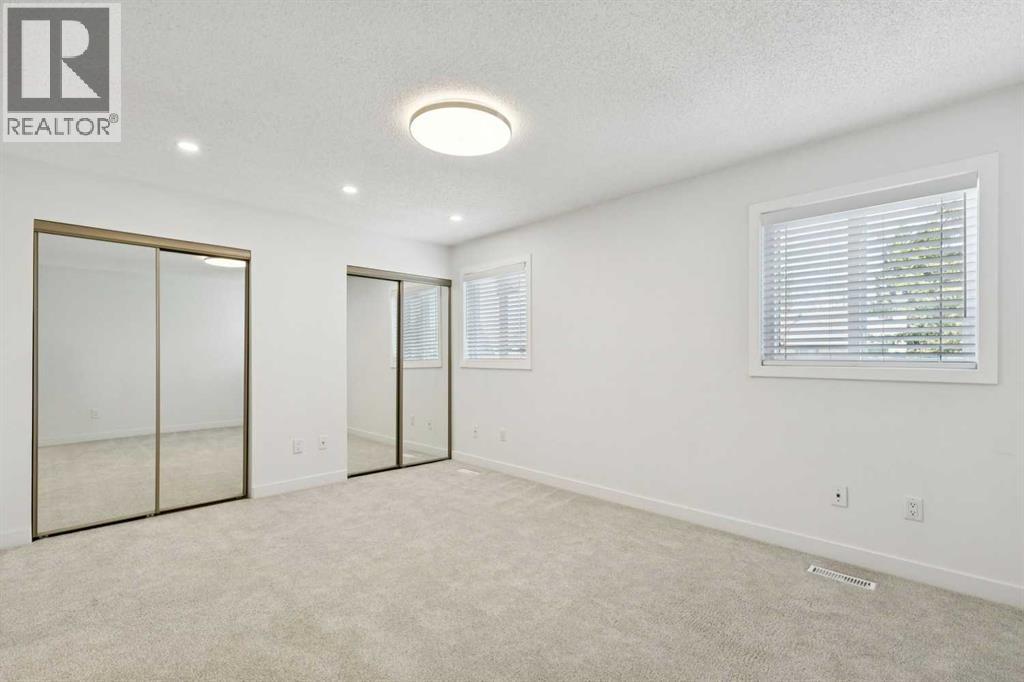 74 Glamis Gardens SW, Calgary, Alberta  T3E 6S4 - Photo 20 - A2307729