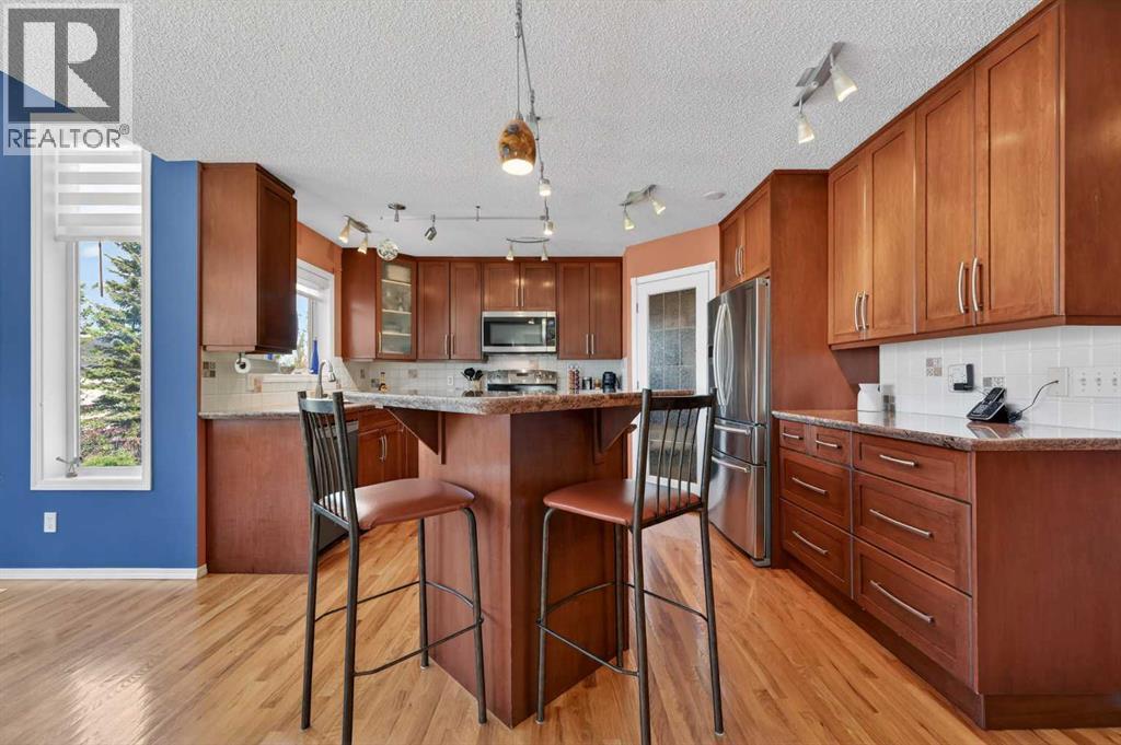 230 Rocky Ridge Cove NW, Calgary, Alberta  T3G 4L1 - Photo 12 - A2303867