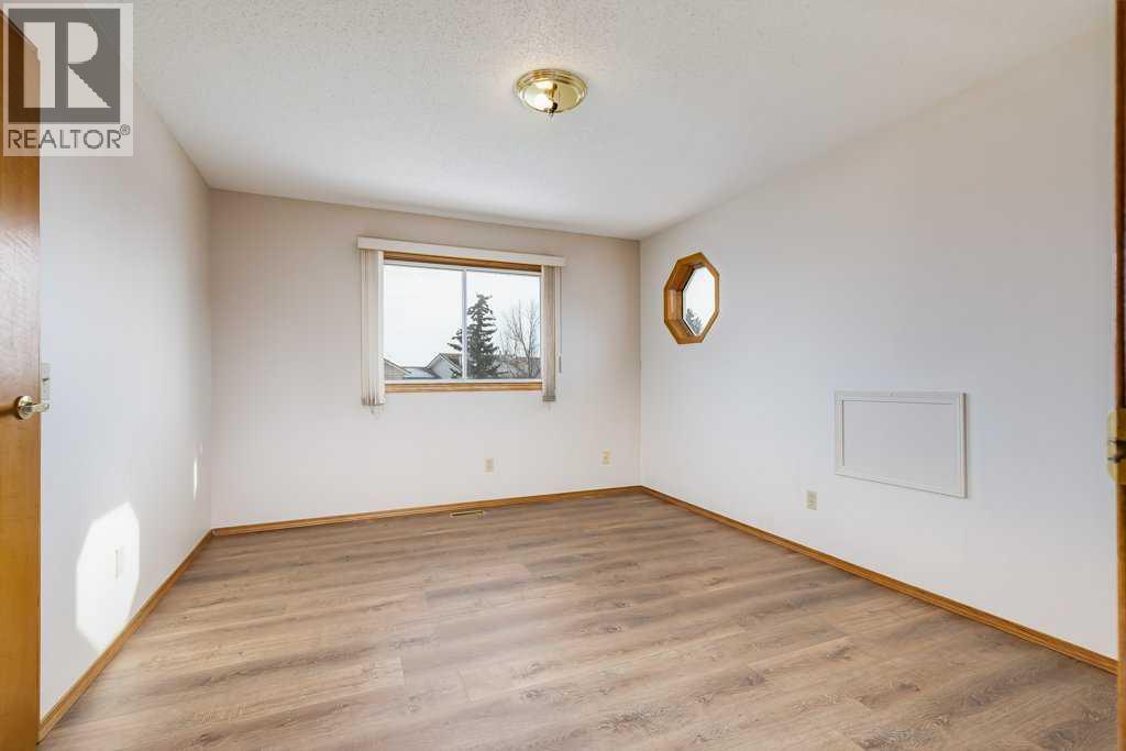 106 Sienna Hills Drive SW, Calgary, Alberta  T3H 2C8 - Photo 26 - A2282460