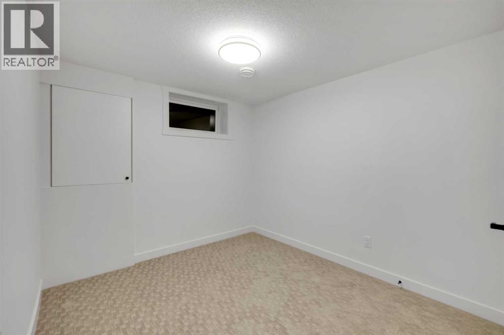 6316 Travois Crescent NW, Calgary, Alberta  T2K 3S7 - Photo 36 - A2292570