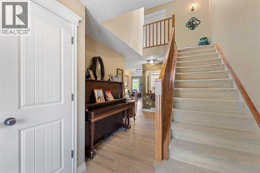 66 Sheep River Cove, Okotoks, Alberta  T1S 2L4 - Photo 2 - A2313157