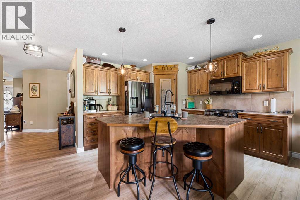 66 Sheep River Cove, Okotoks, Alberta  T1S 2L4 - Photo 9 - A2313157