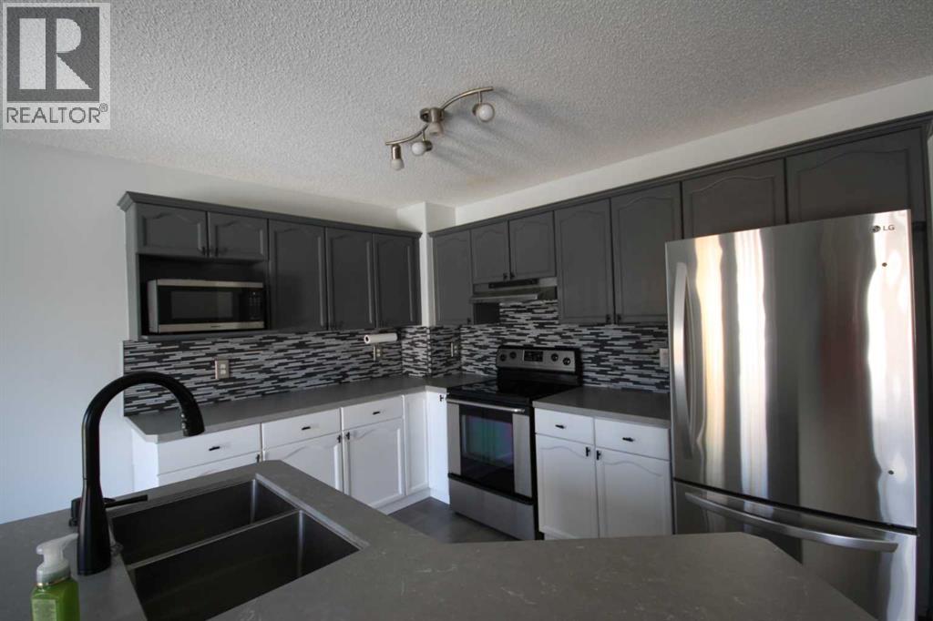 309 Bridleridge Way SW, Calgary, Alberta  T2Y 4M5 - Photo 14 - A2303250