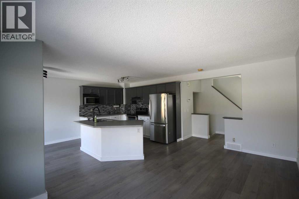 309 Bridleridge Way SW, Calgary, Alberta  T2Y 4M5 - Photo 9 - A2303250