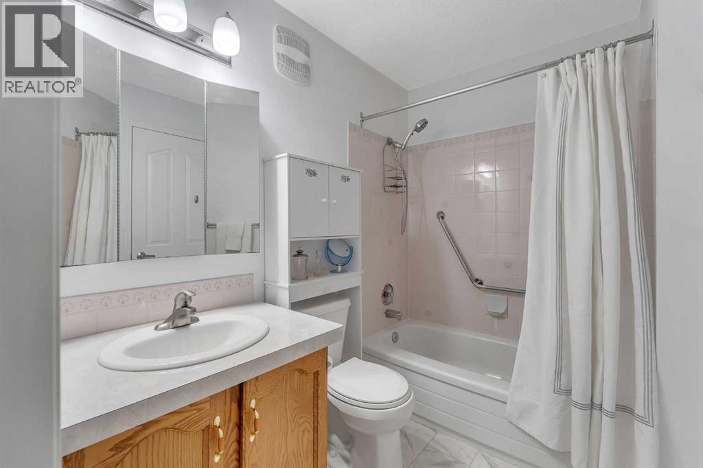 210, 309 Woodside Drive NW, Airdrie, Alberta  T4B 2E7 - Photo 18 - A2311433
