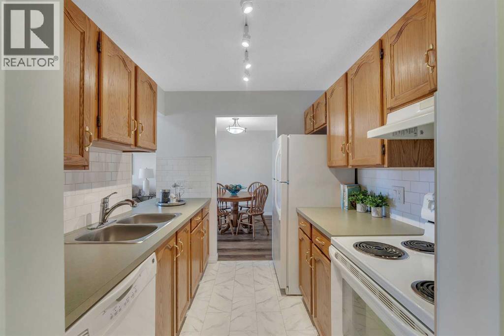 210, 309 Woodside Drive NW, Airdrie, Alberta  T4B 2E7 - Photo 4 - A2311433