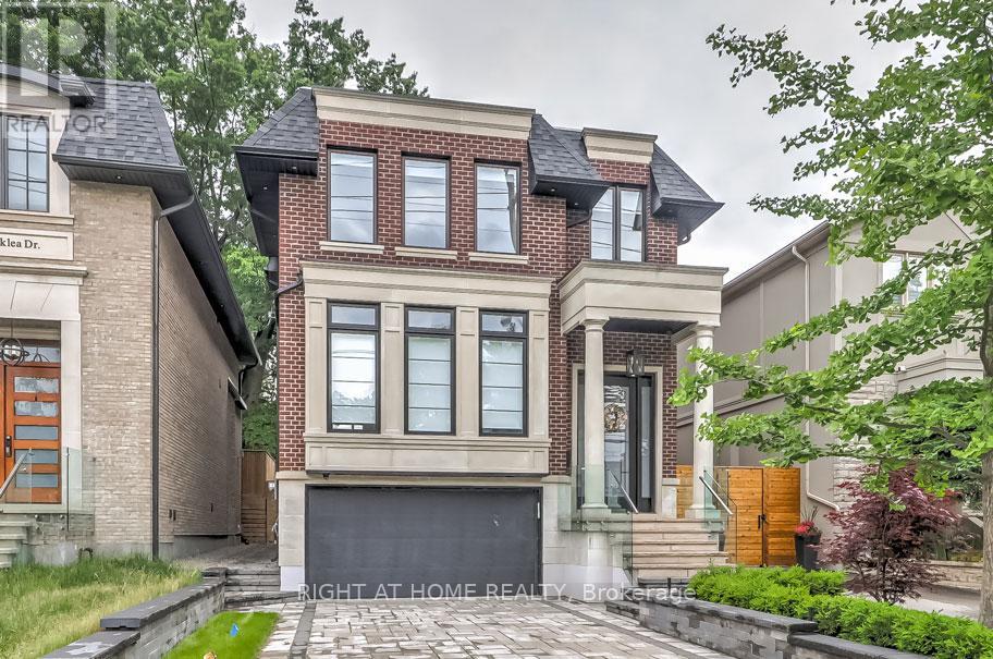 <div class="slider-price">$3,398,000</div><p>102 Parklea Drive, Toronto, Ontario</p>