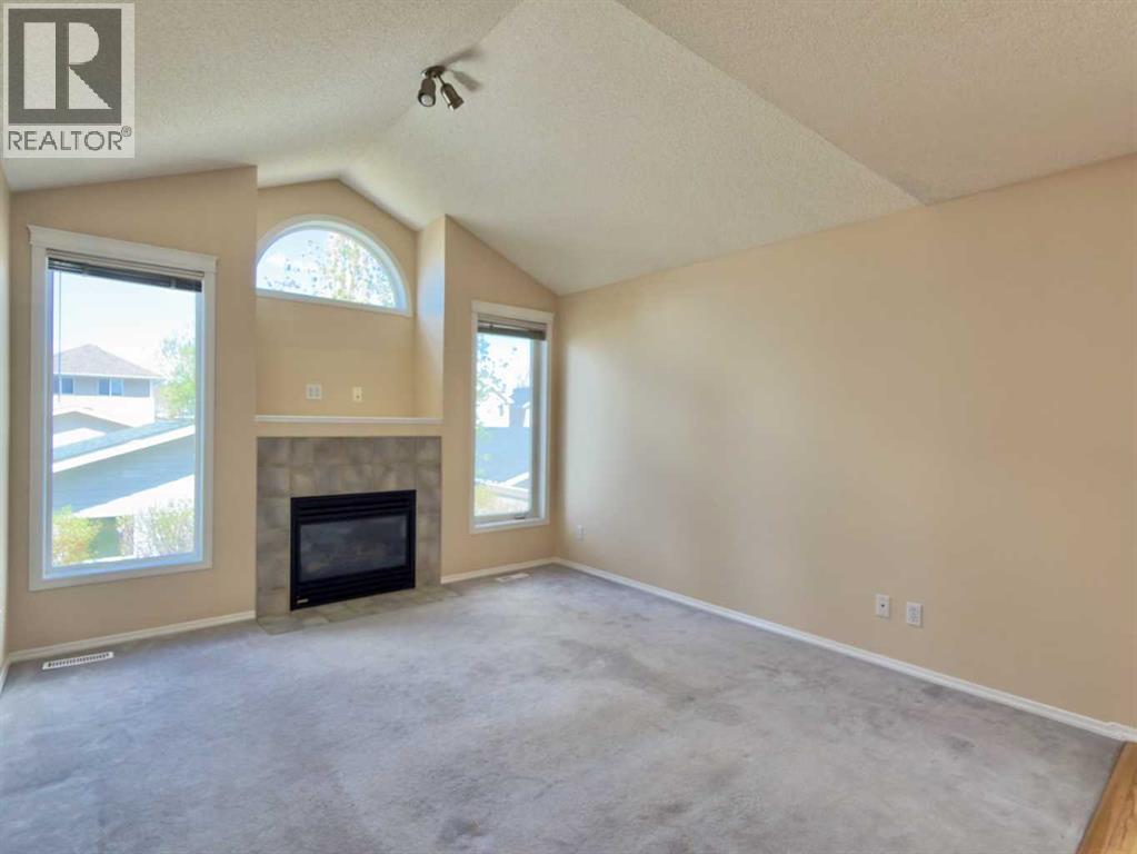206 Tuscany Drive NW, Calgary, Alberta  T3L 2C4 - Photo 3 - A2311286