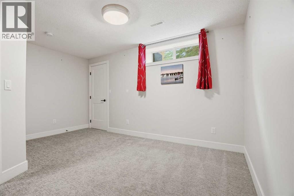 44 Vandoos Gardens NW, Calgary, Alberta  T3A 4W4 - Photo 29 - A2313465
