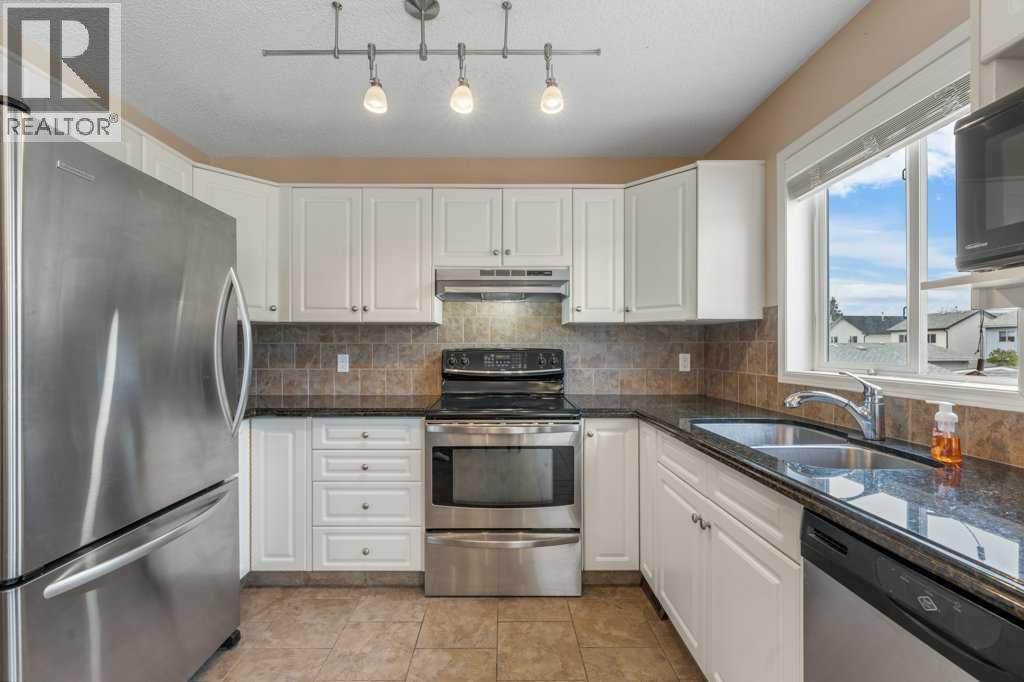10744 Hidden Valley Drive NW, Calgary, Alberta  T3A 5K1 - Photo 7 - A2313517