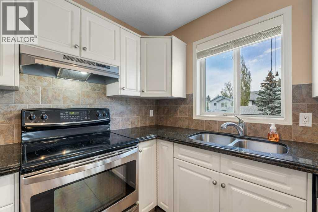 10744 Hidden Valley Drive NW, Calgary, Alberta  T3A 5K1 - Photo 8 - A2313517