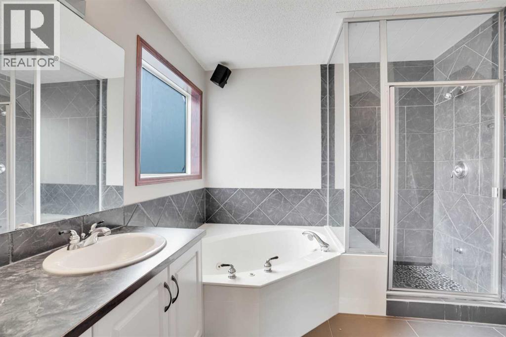 161 Panamount Close NW, Calgary, Alberta  T3K 5P6 - Photo 24 - A2313177