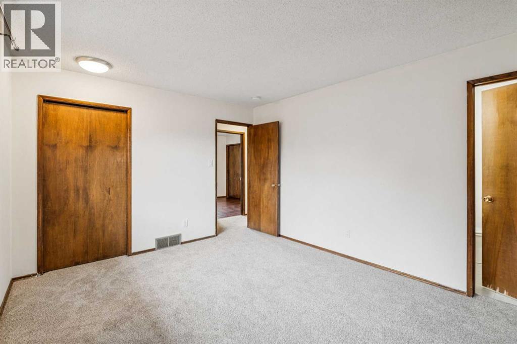 1260 Lake Sylvan Drive SE, Calgary, Alberta  T2J 3C8 - Photo 12 - A2308055