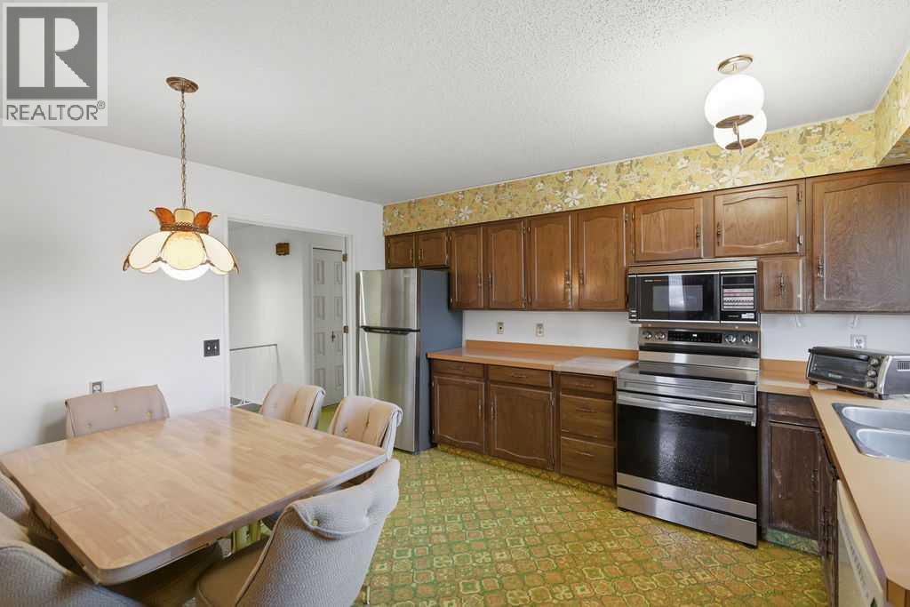 5516 Dalhart Hill Nw, Calgary, Alberta  T3A 1S9 - Photo 16 - A2285431