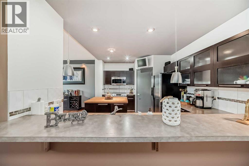 206 Tuscany Ravine Close NW, Calgary, Alberta  T3L 2X4 - Photo 9 - A2288176
