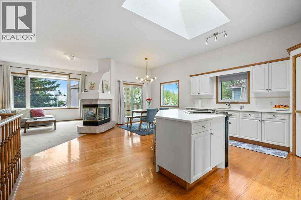 125 Woodpark Close SW, Calgary, Alberta  T2W 6H1 - Photo 3 - A2313625
