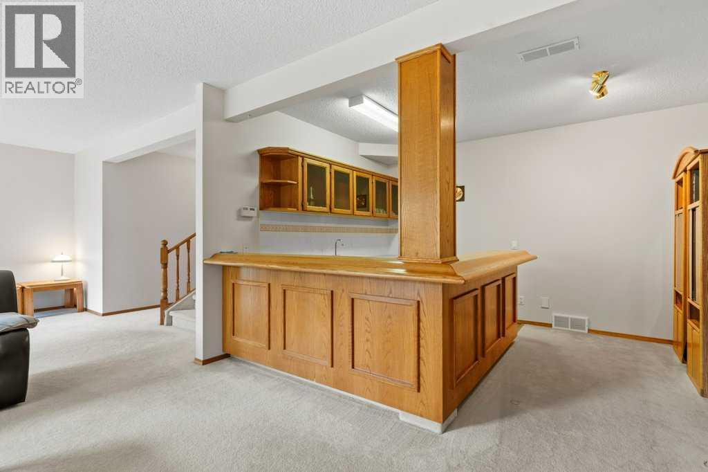 125 Woodpark Close SW, Calgary, Alberta  T2W 6H1 - Photo 32 - A2313625
