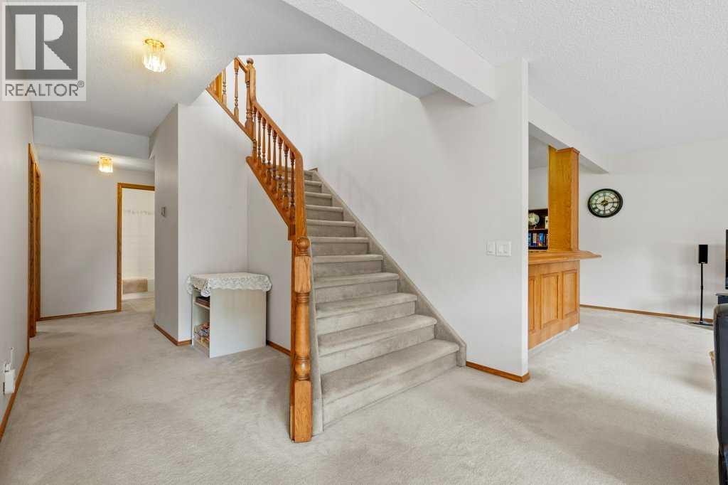 125 Woodpark Close SW, Calgary, Alberta  T2W 6H1 - Photo 34 - A2313625